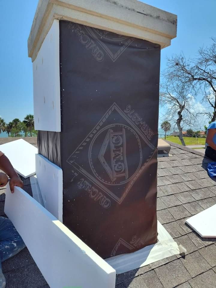 Chimney reconstruction, exterior insulation, and weatherproofing flashing