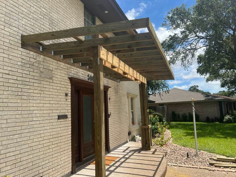 Custom timber portico and architectural cedar arbor framing